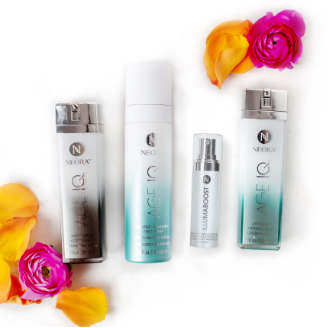 Four bottles appear in Age IQ® Cleanse, Correct, Protect Set including: Neora Age IQ Night Cream, Illumaboost, Dual-action Cleanser and Age IQ Day Cream.